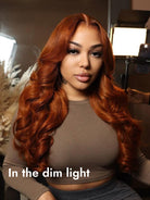 copper orange hair wig under dim light